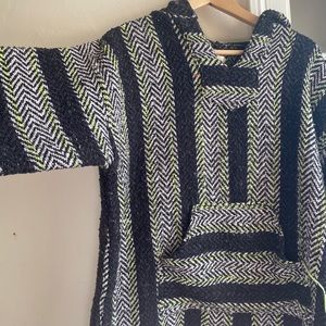 Black and white and neon green cozy hooded pullover